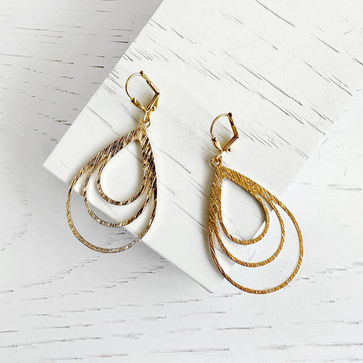 Multiple Teardrop Dangle Earrings in Brushed Gold