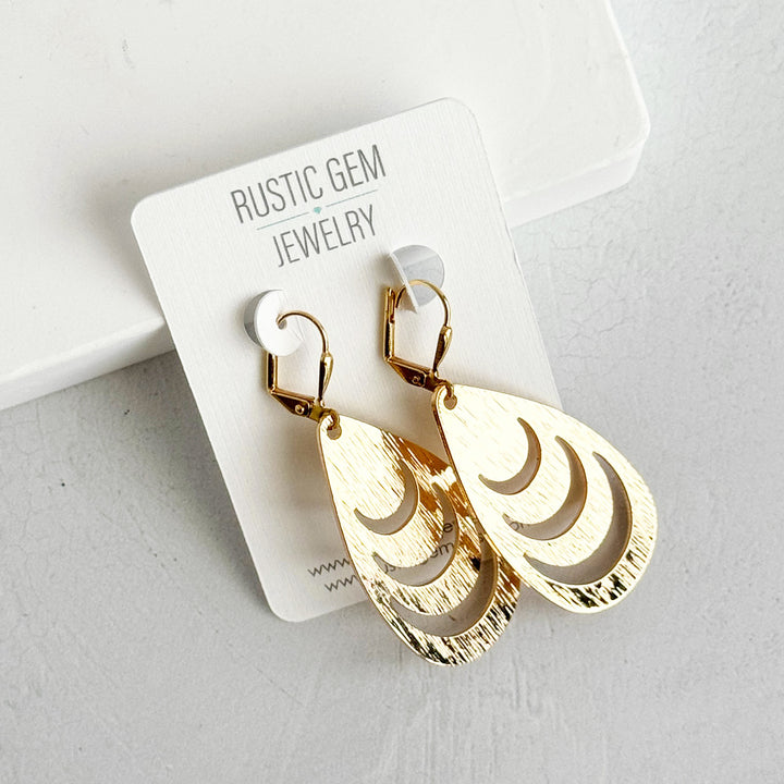 Teardrop Earrings with Crescent Cutouts in Brushed Gold
