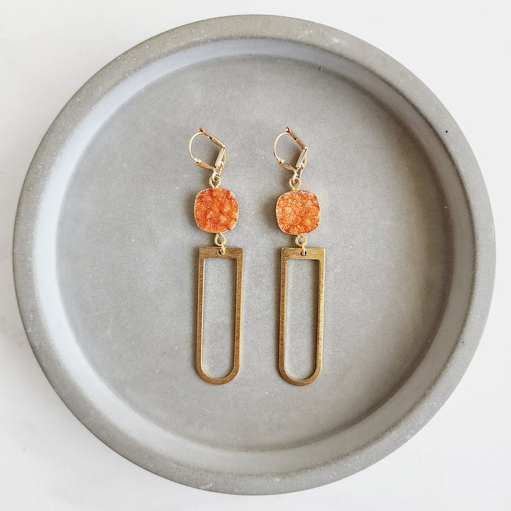 Long Horseshoe Dangle Earrings with Orange Druzy Stone in Brushed Brass