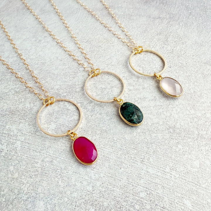 Gemstone and Circle Pendant Necklaces in Gold