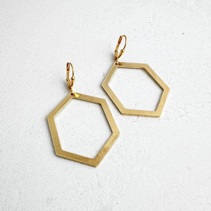 Hexagon Dangle Earrings in Brushed Gold