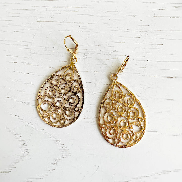 Ornate Teardrop Dangle Earrings in Brushed Brass Gold