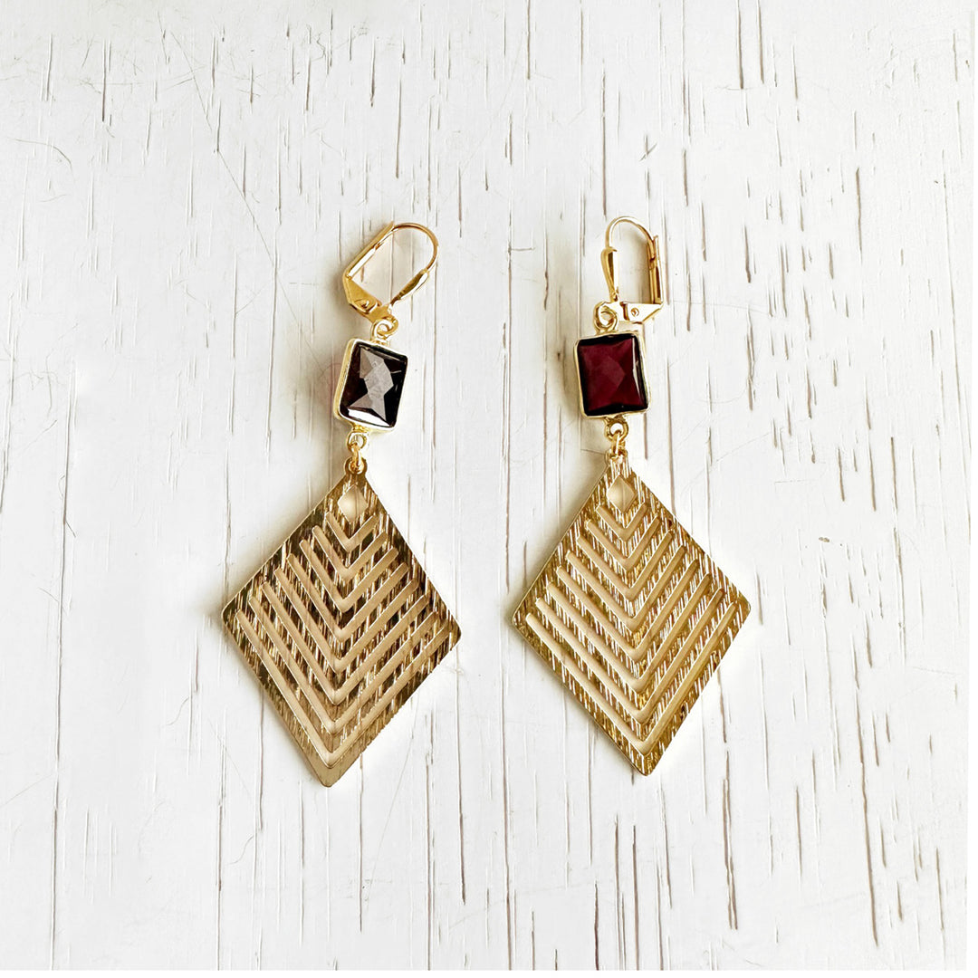 Garnet and Patterned Diamond Pendant Earrings in Brushed Gold