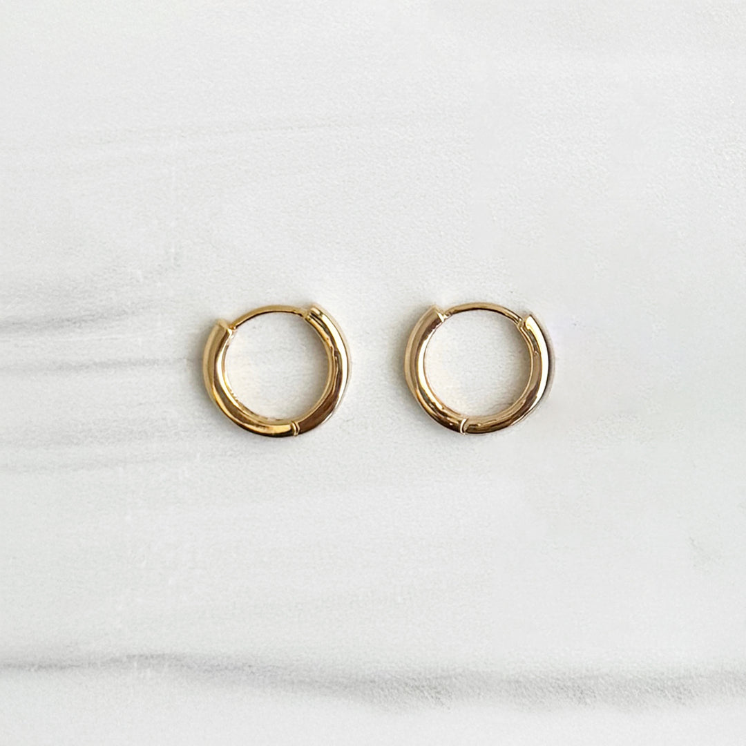 Tiny Round Huggie Earrings in 18k Gold