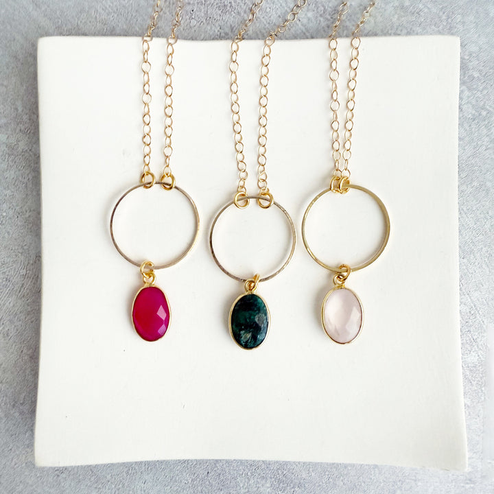 Gemstone and Circle Pendant Necklaces in Gold