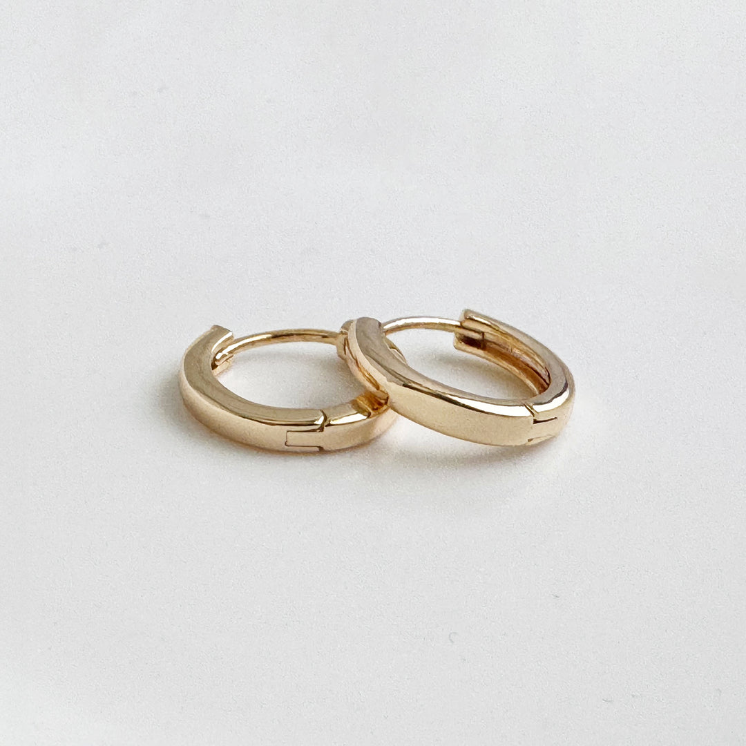 Tiny Round Huggie Earrings in 18k Gold