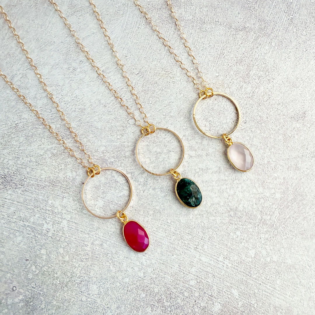 Gemstone and Circle Pendant Necklaces in Gold