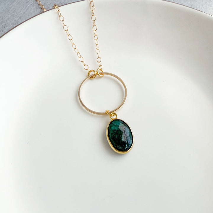 Gemstone and Circle Pendant Necklaces in Gold