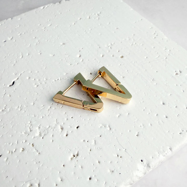 Elongated Triangle Huggie Earrings in Gold