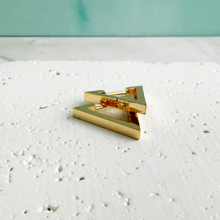Triangle Huggie Earrings in Gold