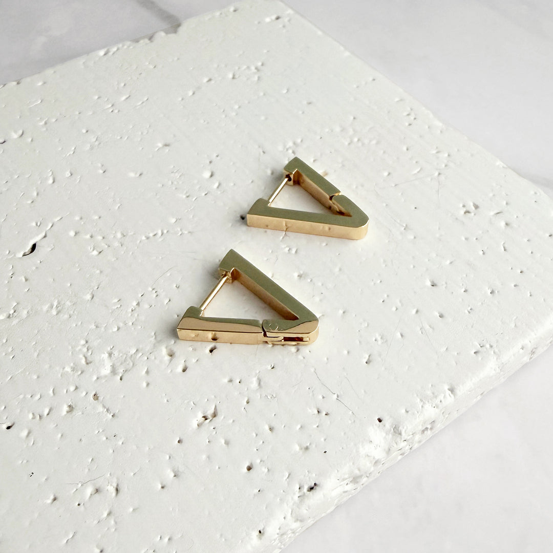 Elongated Triangle Huggie Earrings in Gold