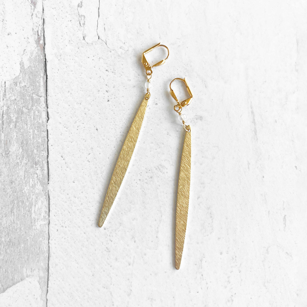 Long Stick Earrings in Brushed Gold with Clear Quartz Beads