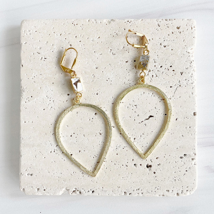 Inverted Teardrop and White Mojave Stone Statement Earrings in Brushed Brass Gold