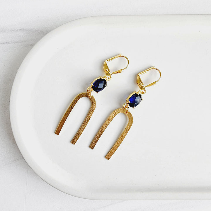 Gold Horseshoe Earrings with Sapphire Blue Stones