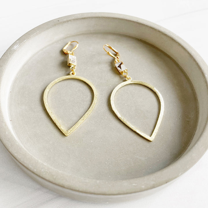 Inverted Teardrop and White Mojave Stone Statement Earrings in Brushed Brass Gold