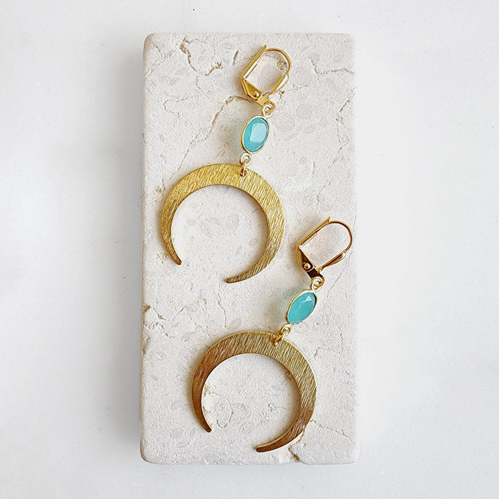 Crescent Dangle Earrings with Small Aqua Stone in Brushed Brass