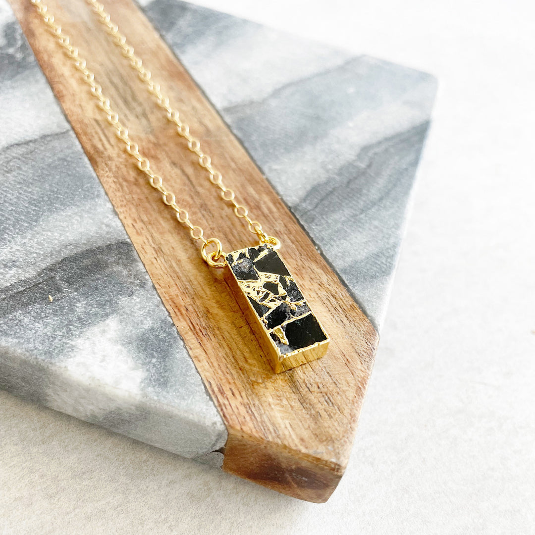 Black Mojave Bar Necklace in Gold. Simple Gold Layering Necklace