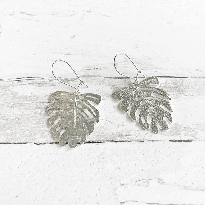 Monstera Leaf Dangle Earrings in Brushed Silver. Plant Dangle Earrings