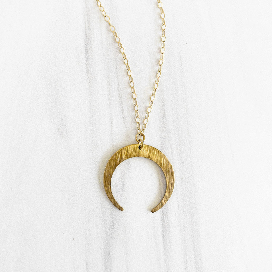 Brushed Brass Crescent Moon Necklace in Gold